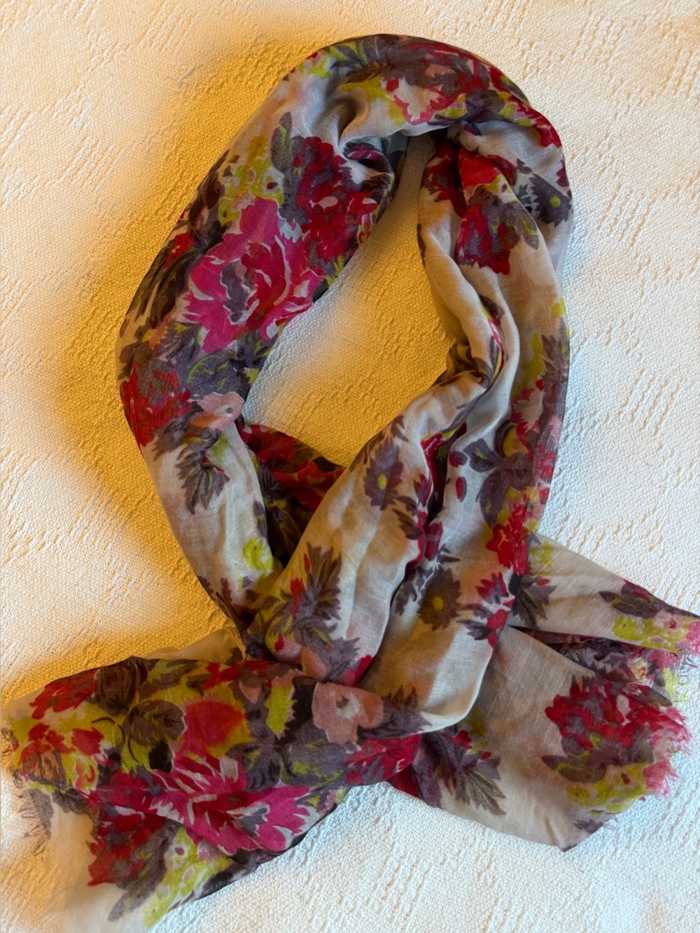 Charming Charlie perfect scarf in creamy sand with pops of colorful flowers.